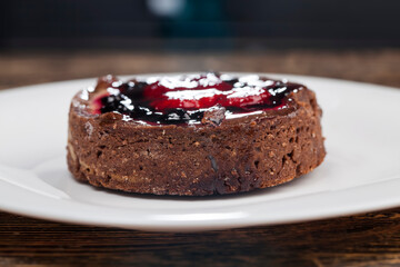 dessert tartlet of dough with cheese cream and berries