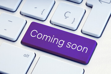 Coming soon phrase on computer Keyboard Key