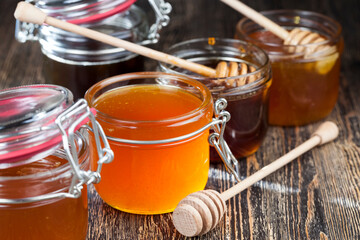 flower honey from different varieties of flowers, bottled in different cans