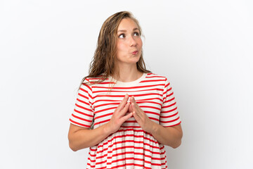 Young caucasian woman isolated on white background scheming something