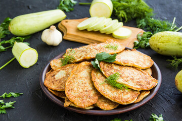 A healthy breakfast of zucchini pancakes. Creative atmospheric decoration
