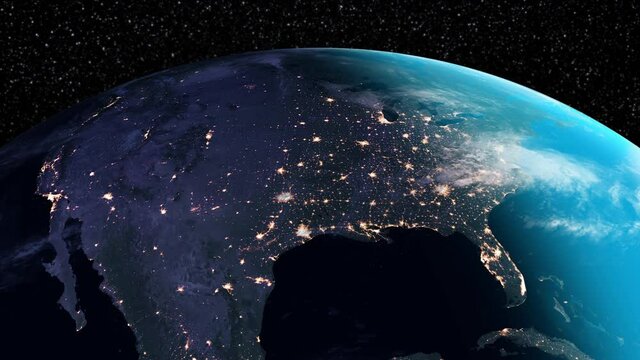 Magnificent satellite view of North America. It can be seen how the border of night and day is shifting from east to west.