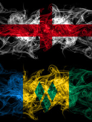 Flag of England, English and Saint Vincent and the Grenadines countries with smoky effect