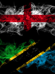 Flag of England, English and Tanzania countries with smoky effect
