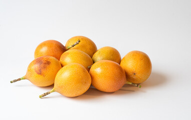 Granadilla or yellow passion fruit isolated on white background. Grenadia Passion fruit Cut in Half Exotic Fruits