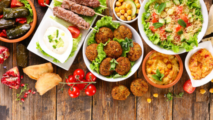 middle eastern or arabic cuisine- falafel, tabboulh,  hummus, pita