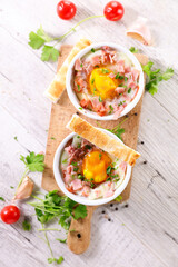 baked egg with bacon and bread toast