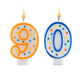 Burning birthday candles isolated on white background, number 90