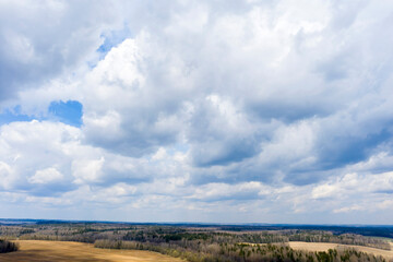 Aerial view of agricultural landscape with fields in spring season.