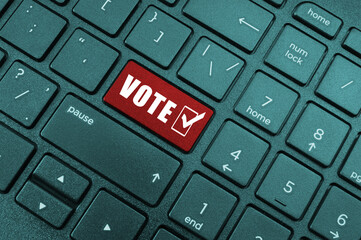Red vote key on laptop keyboard