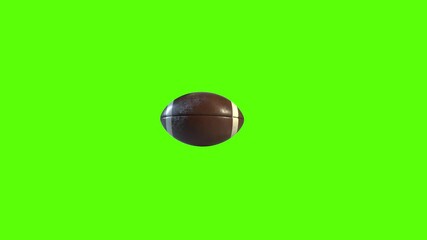 American Football from a side on view in a looping spin. Realistic 3D animated football in a continuous roll perfect for sports advertising. Green screen footage to isolate the ball. - Powered by Adobe