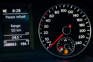 low fuel level on the car dashboard