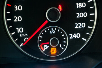 low fuel level on the car dashboard