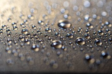 Drops of water on surface, abstract background