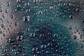 Drops of water on surface, abstract background