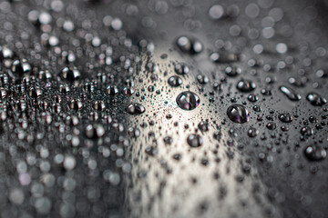 Drops of water on surface, abstract background