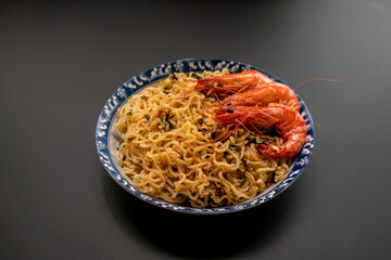 Delicious tiger shrimp noodles on the plate