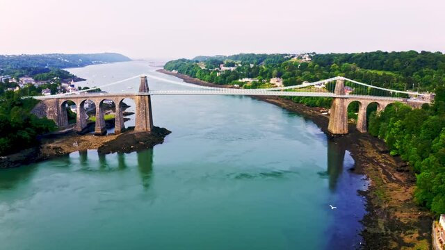 Aerial view of Telford's Suspension Bridge Across The Menai Starights - Wales, UK.