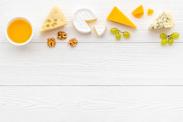 Set of different types of cheese. Camembert parmesan and brie cheeses 