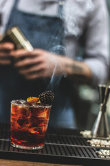 Bartender making cocktails