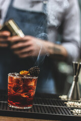 Bartender making cocktails