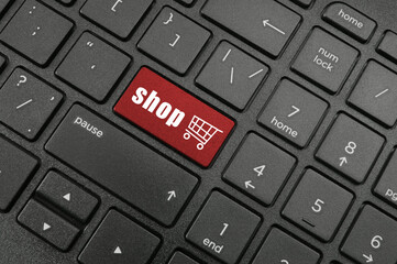 Online shopping concept, keyboard with button shop
