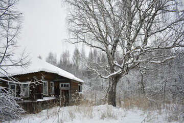 abandoned village in the snow in winter