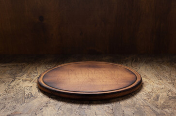 Pizza cutting board for homemade bread cooking or baking on table. Wooden tabletop background