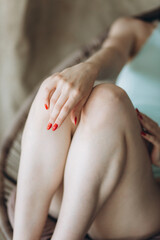 Obraz na płótnie Canvas Woman legs, nude photosession