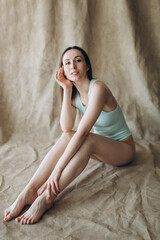 Naklejka premium Close up woman portrait, flexibility sensual body in bikini underwear