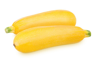 Vegetable composition with whole fresh zucchini isolated on a white background.