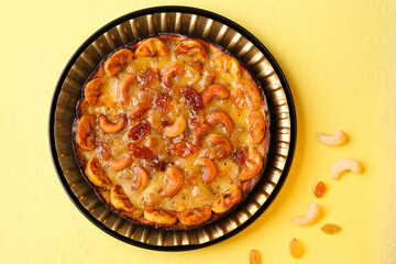 Malabar banana cake kayappola , pazham pola , banana pie made in skillet fruitcake made with eggs and Kerala banana for Ramadan, Eid . tea time snack breakfast dessert India Sri Lanka 