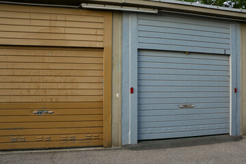 Fototapeta na wymiar old closed metallic garages in a row