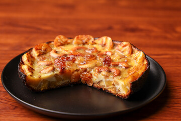 Malabar banana cake kayappola , pazham pola , banana pie made in skillet fruitcake made with eggs and Kerala banana for Ramadan, Eid . tea time snack breakfast dessert India Sri Lanka 