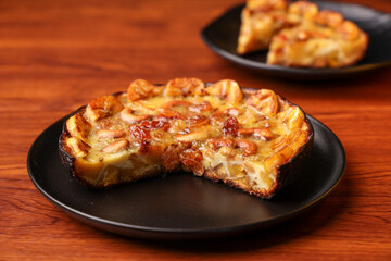 Malabar banana cake kayappola , pazham pola , banana pie made in skillet fruitcake made with eggs and Kerala banana for Ramadan, Eid . tea time snack breakfast dessert India Sri Lanka 