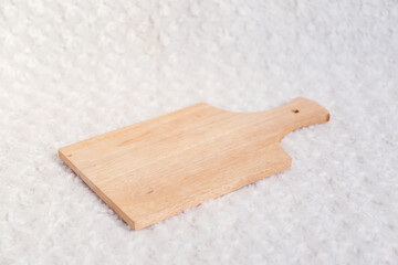 Wooden cutting board empty on white background