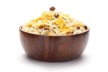 Close-Up of Crunchy Diet Mixture In hand-made (handcrafted) wooden bowl made with Puffed Rice, Corn Flakes, and Curry leaves. Indian spicy snacks (Namkeen),