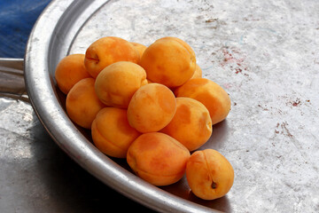 apricots on a market stall
