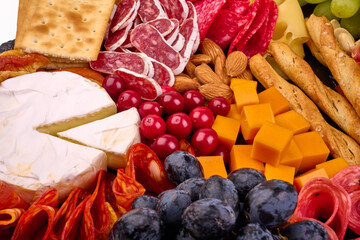 Cured meat and cheese platter, cheese board.