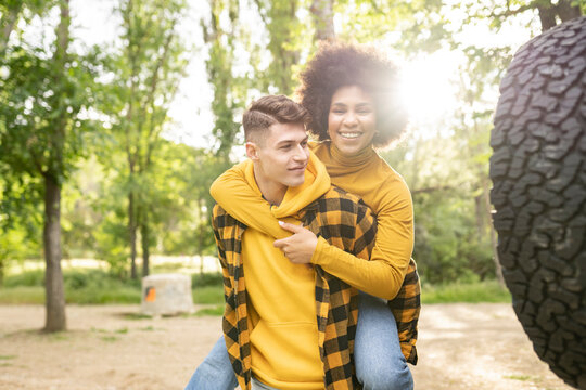 Young diverse couple having fun in nature