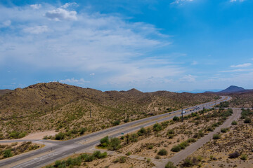 A trip at high speed through the Arizona desert to the distant mountains