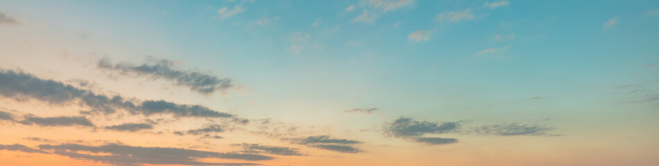 Beautiful summer sky sunset, blue, yellow and red, a sense of peace. The feeling of youth nostalgia.