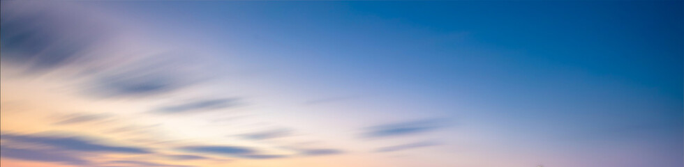 Obraz premium Beautiful summer sky sunset, blue, yellow and red, a sense of peace. The feeling of youth nostalgia.