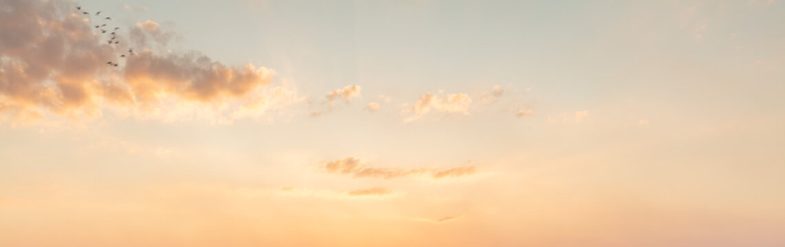 Beautiful summer sky sunset, blue, yellow and red, a sense of peace. The feeling of youth nostalgia.