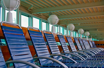 Terrace or patio or balcony on outdoor deck of luxury  cruiseship or cruise ship liner with wooden...
