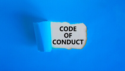 Code of conduct symbol. Words 'Code of conduct' appearing behind torn blue paper. Beautiful blue...