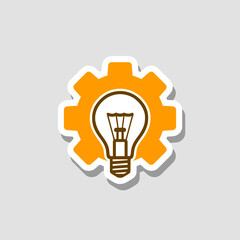 Light bulb and gear icon isolated on gray background