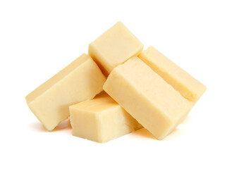 Cubes of cheddar cheese isolated on white  - obrazy, fototapety, plakaty