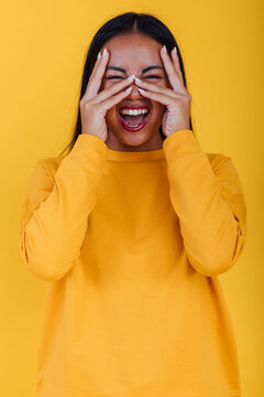 Cheerful Ethnic Woman Screaming On Yellow Background