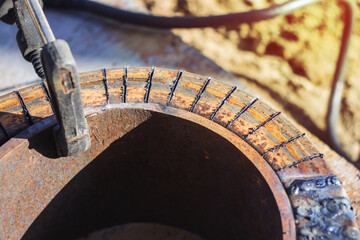 A blank made of a square metal pipe in close-up.